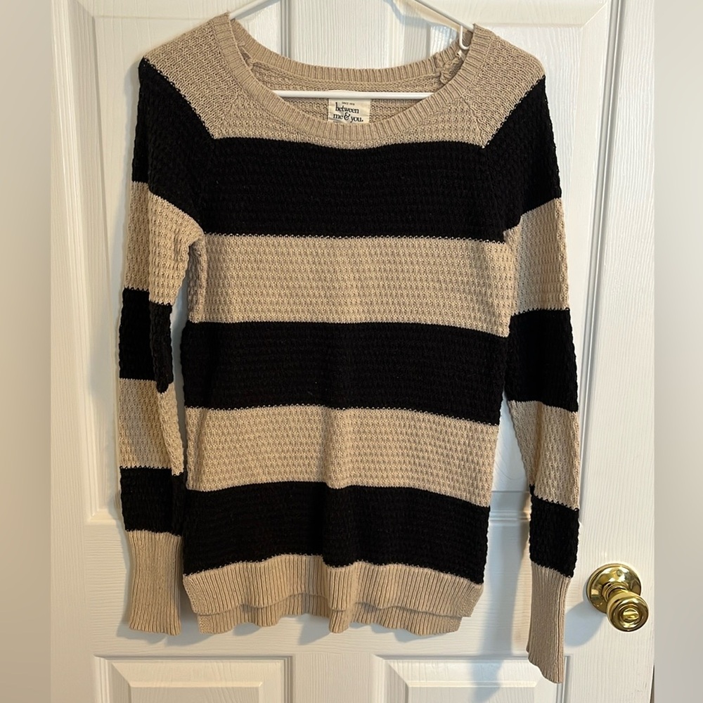 Black and tan sweater